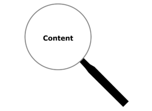Magnifying glass is focused on the word "content."
